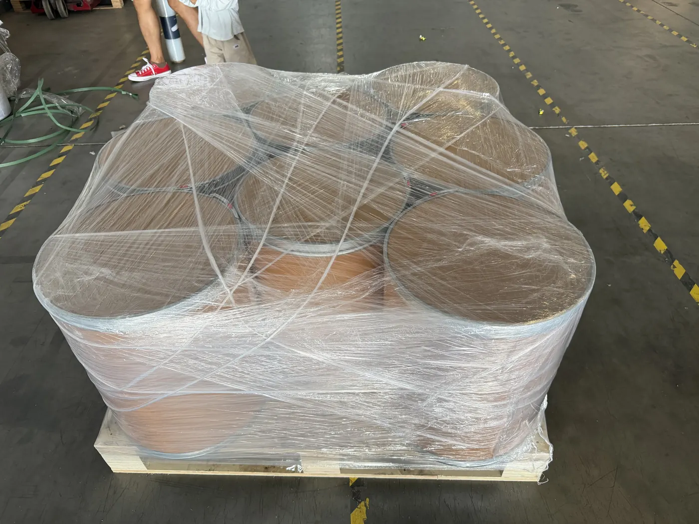 Wrapped nutraceutical ingredient drums prepared for palletized export shipping